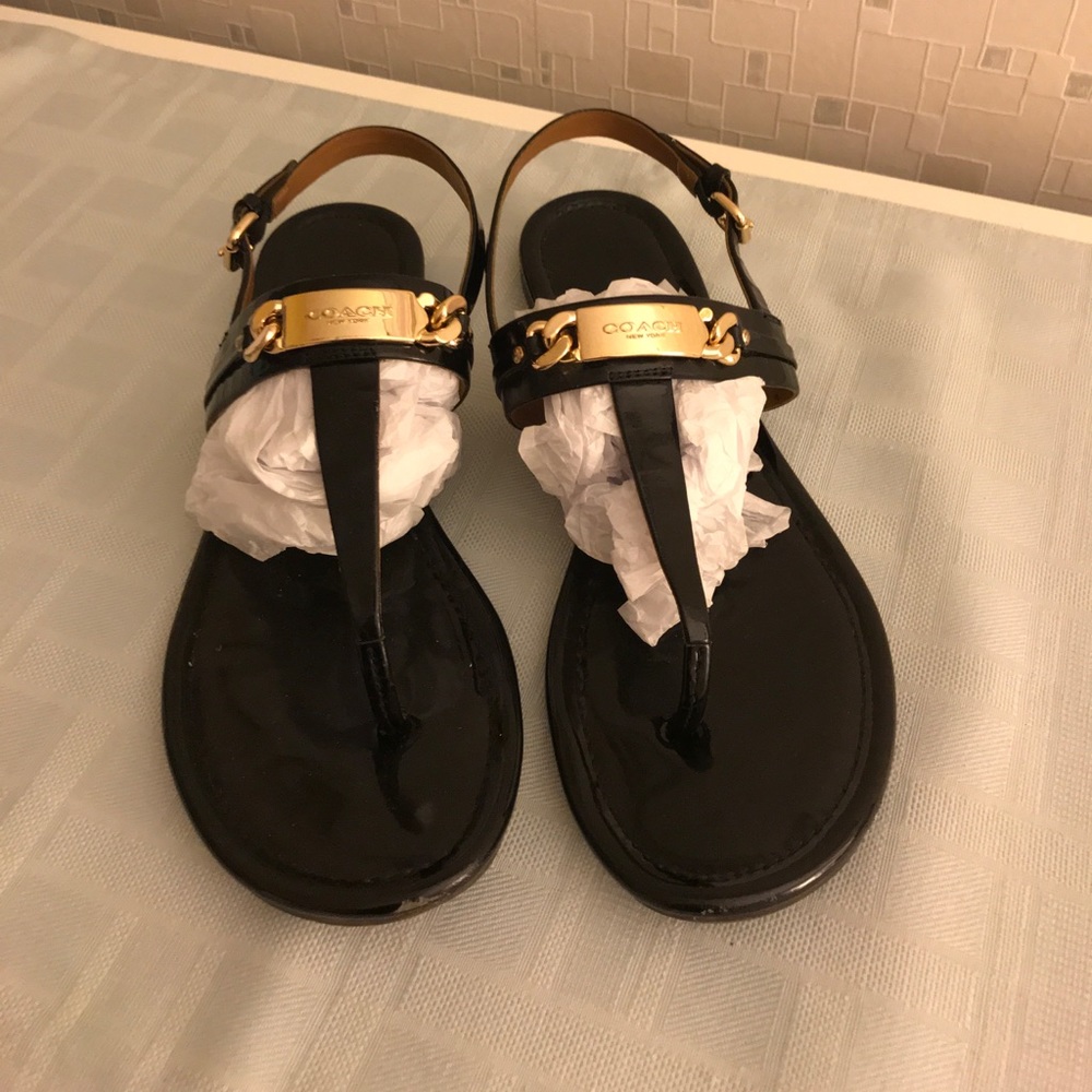 Black patent Coach sandals